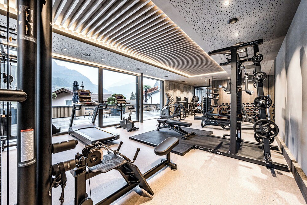 Modern gym with exercise equipment at Alpina in Sölden