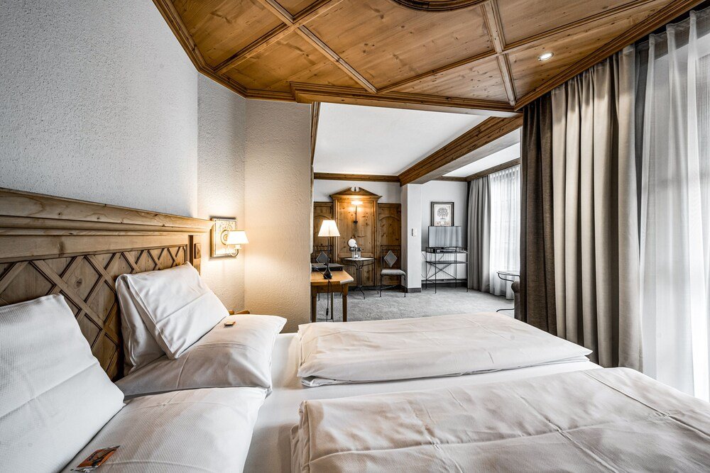 Hotel room with two beds at Alpina in Sölden