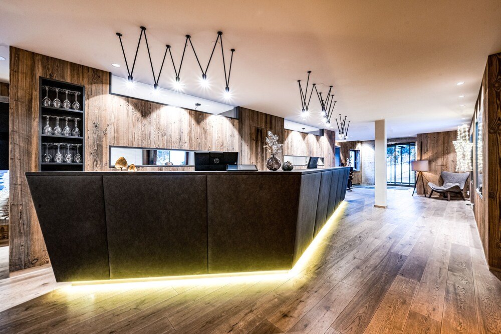 Reception desk in the lobby of the Alpina hotel
