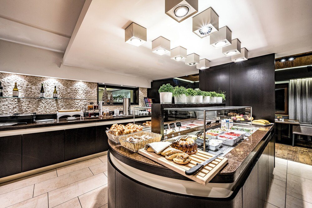 Breakfast bar with buffet counter at the Alpina hotel