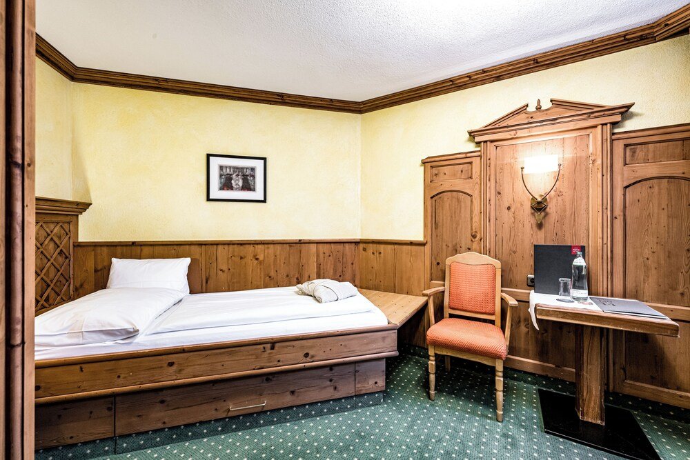 Cozy guest room at the Alpina hotel in Sölden