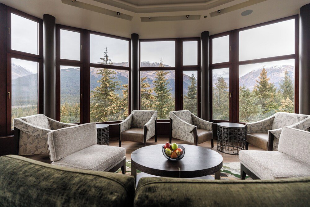 Bright room with large windows and mountain light
