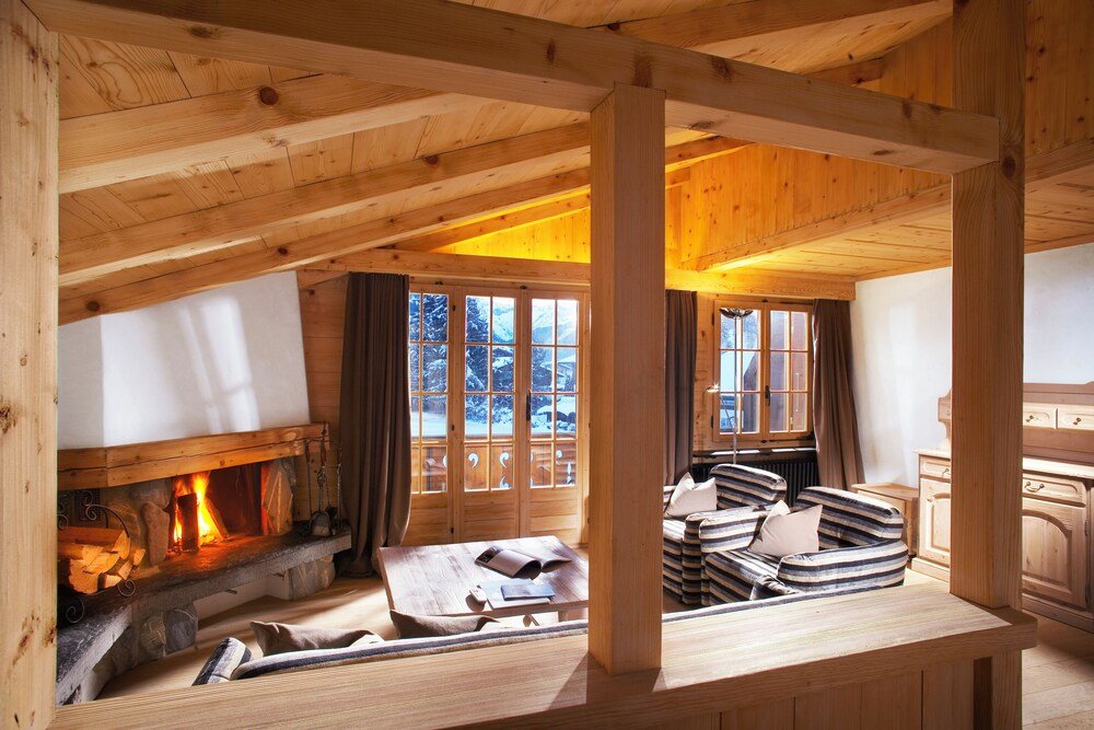 Cozy log cabin interior with a fireplace
