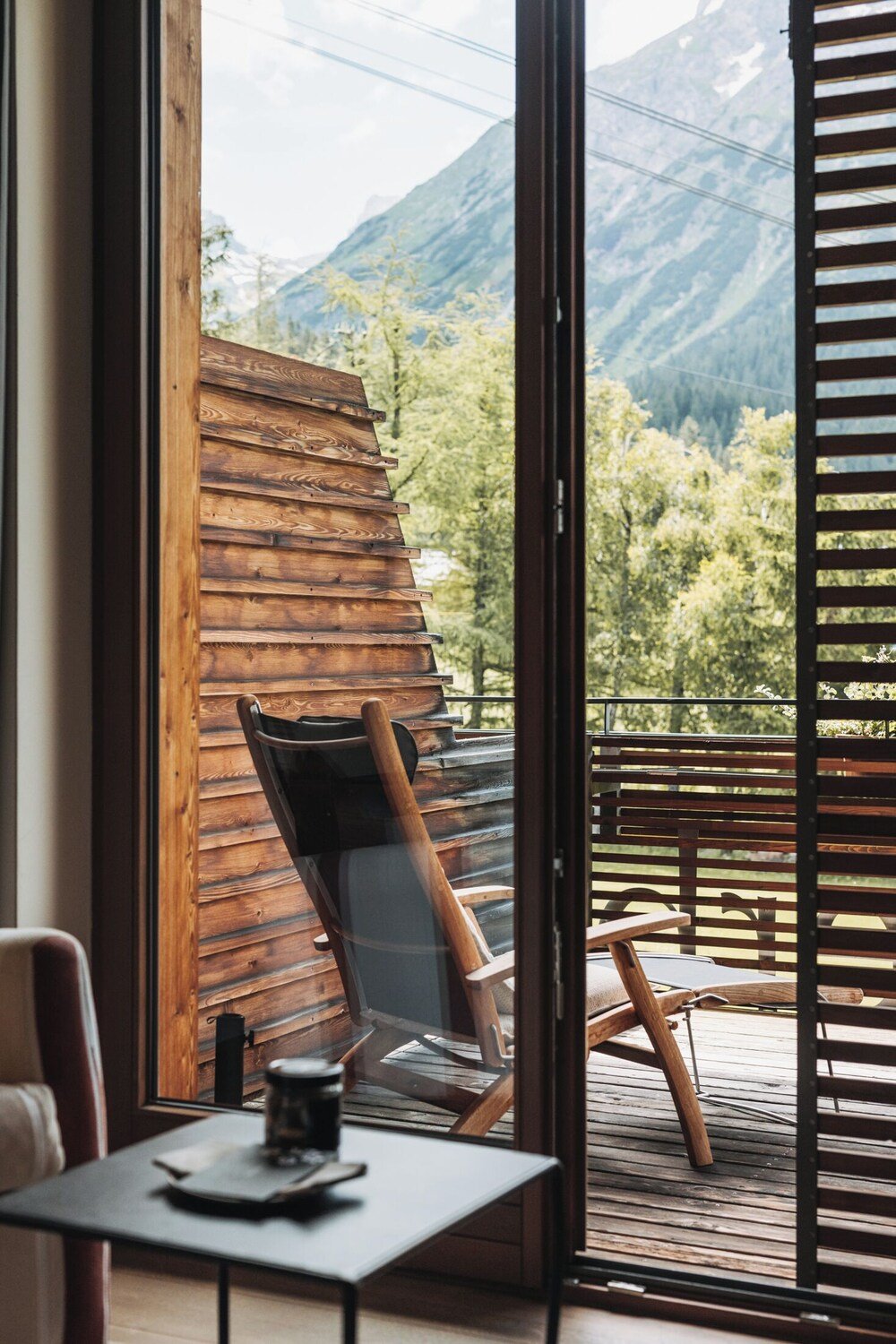 Wooden deck with a mountain view at Der Berghof in Lech