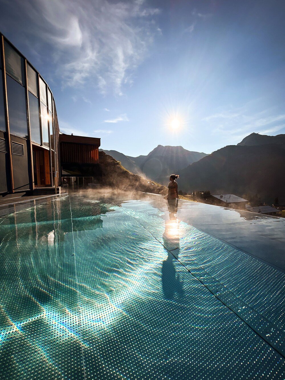 Infinity pool with mountain views at Goldener Berg in Oberlech