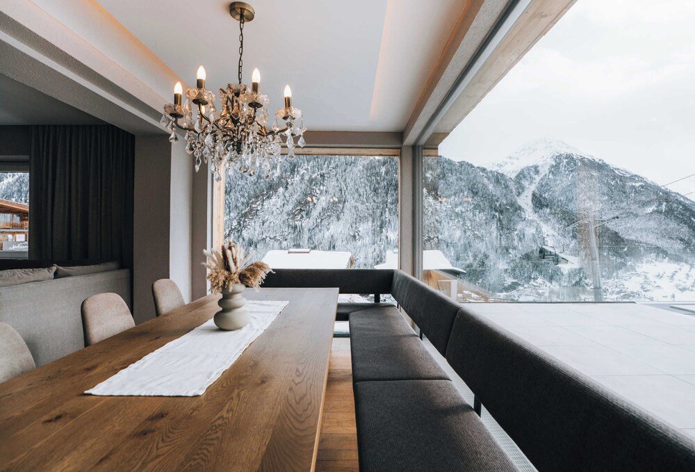 Modern dining area with tables and wooden details