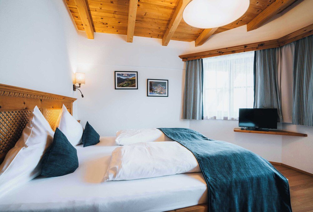 Bright hotel bedroom with simple modern decor