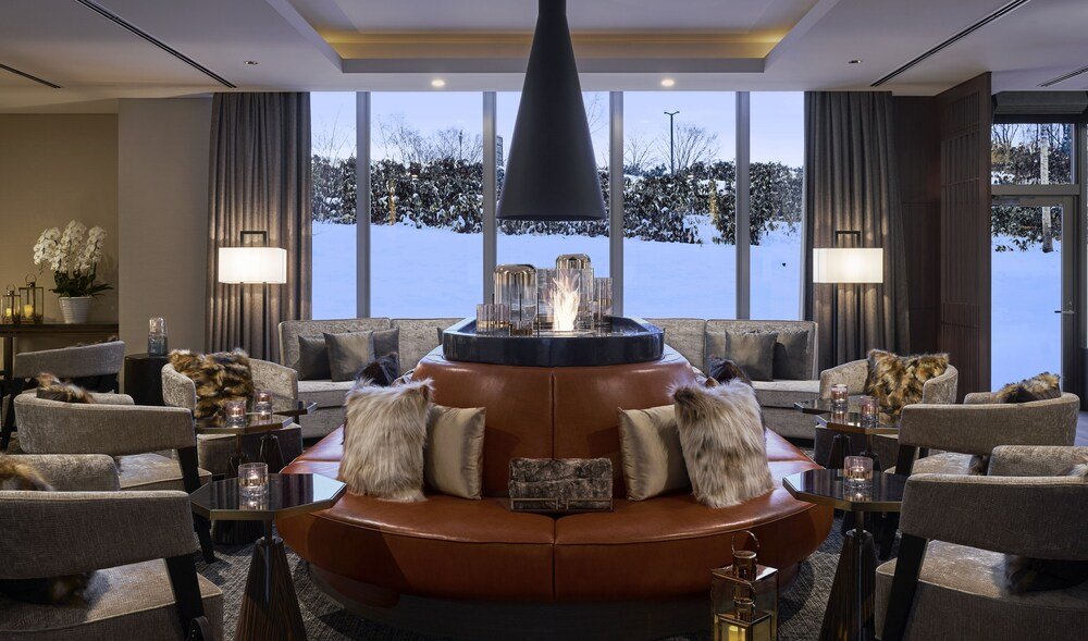 Lounge with leather sofas and a fire feature