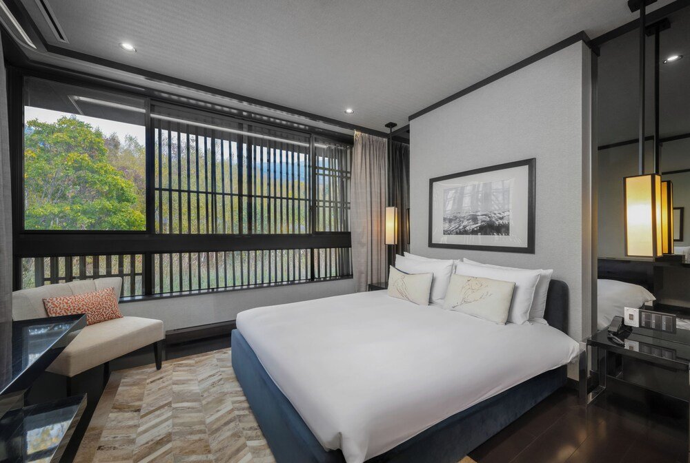 Hotel room with a sofa and desk