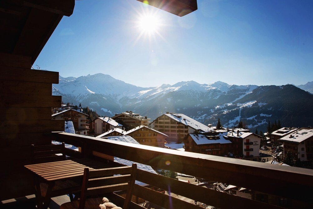 Mountain town of Verbier seen with snow-covered roofs in winter