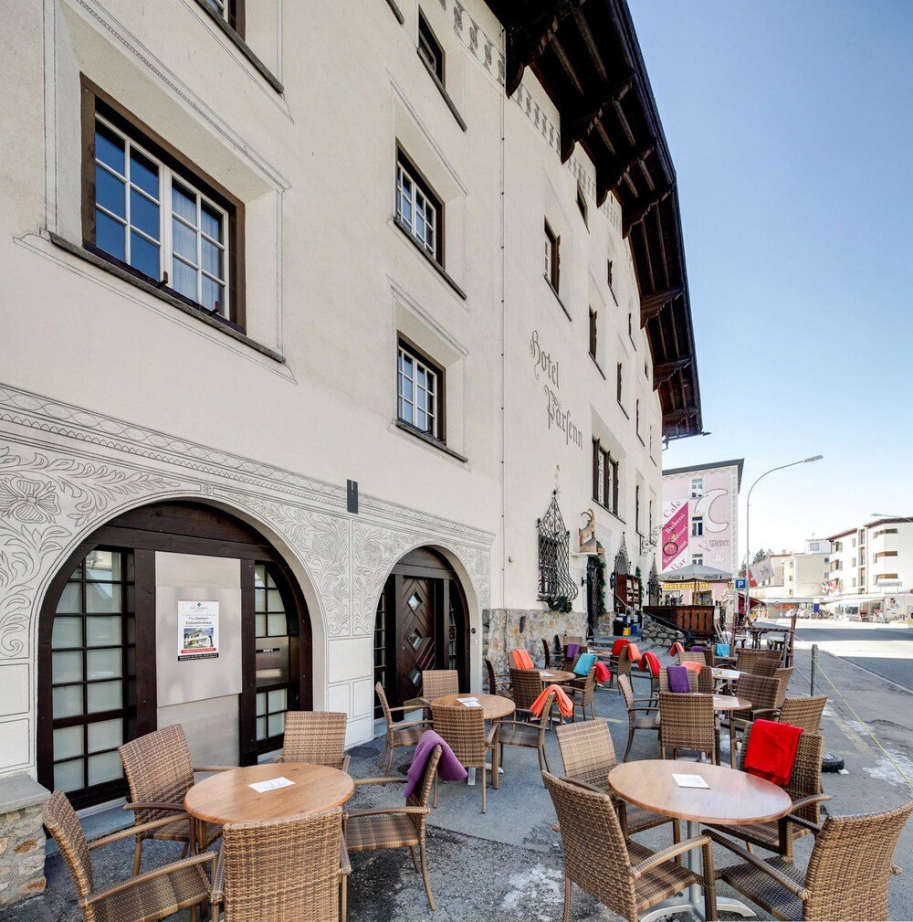 Outdoor seating area with wicker chairs on the terrace