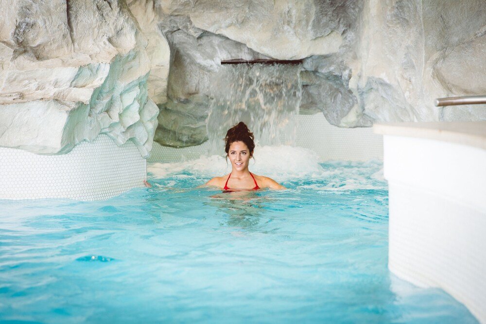 Outdoor hot tub with a mountain view