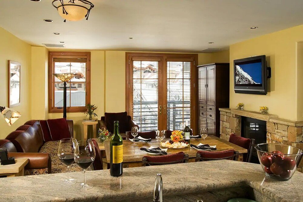 Dining area with wooden tables at Inn at Lost Creek