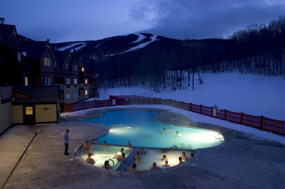 Heated outdoor pool with loungers