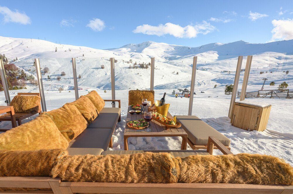 Snow-covered outdoor seating area