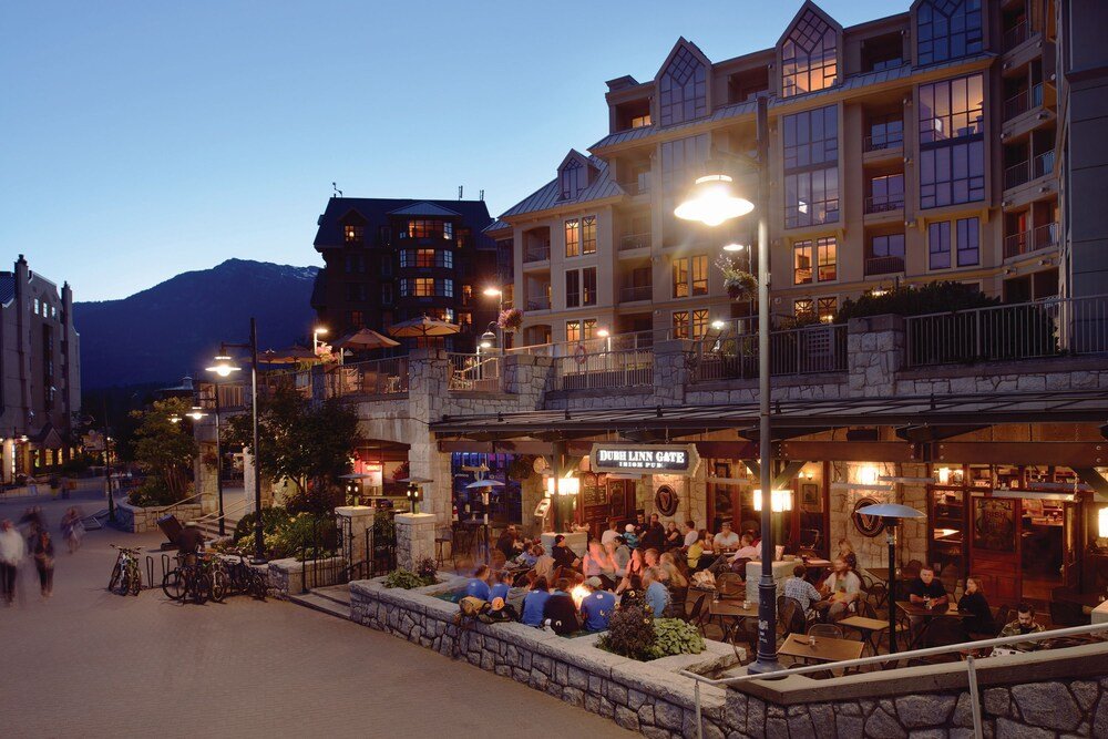 Outdoor seating area at Pan Pacific Whistler Mountainside