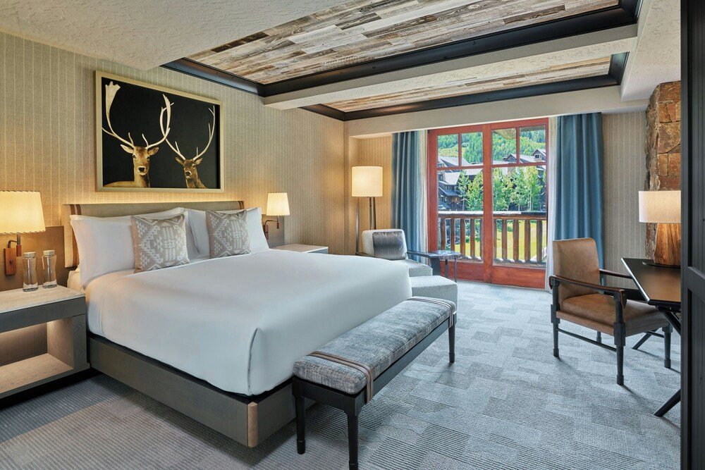 Spacious hotel room with seating at The Ritz-Carlton Bachelor Gulch