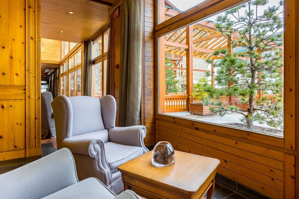 Cozy cabin style interior at the Sport Village hotel