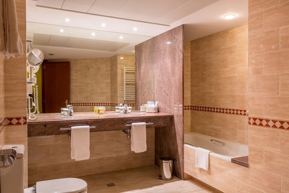 Modern bathroom with a vanity at Sport Village