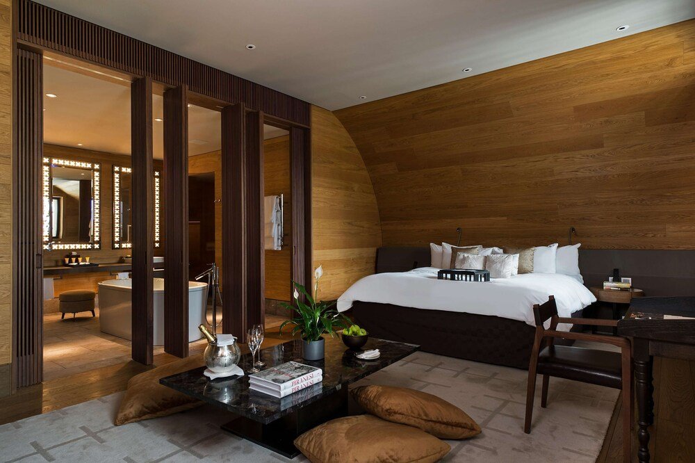 Modern hotel room with a large bed