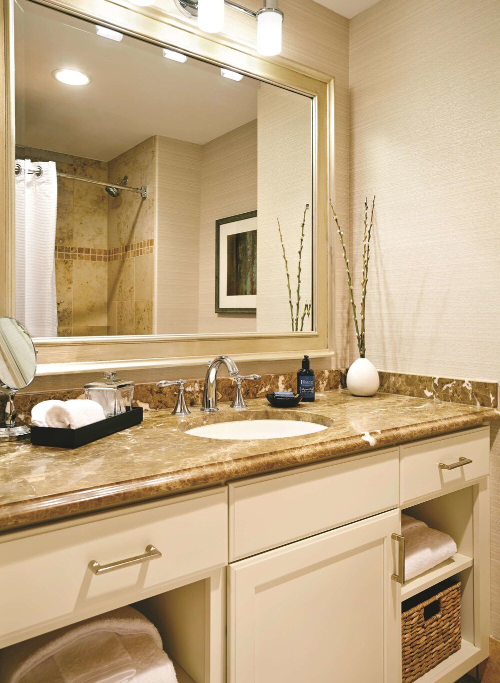 Bathroom with a vanity and shower