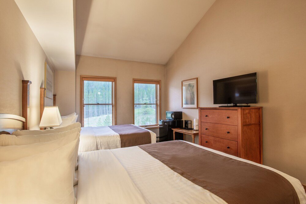 Hotel room with a bed and a small desk