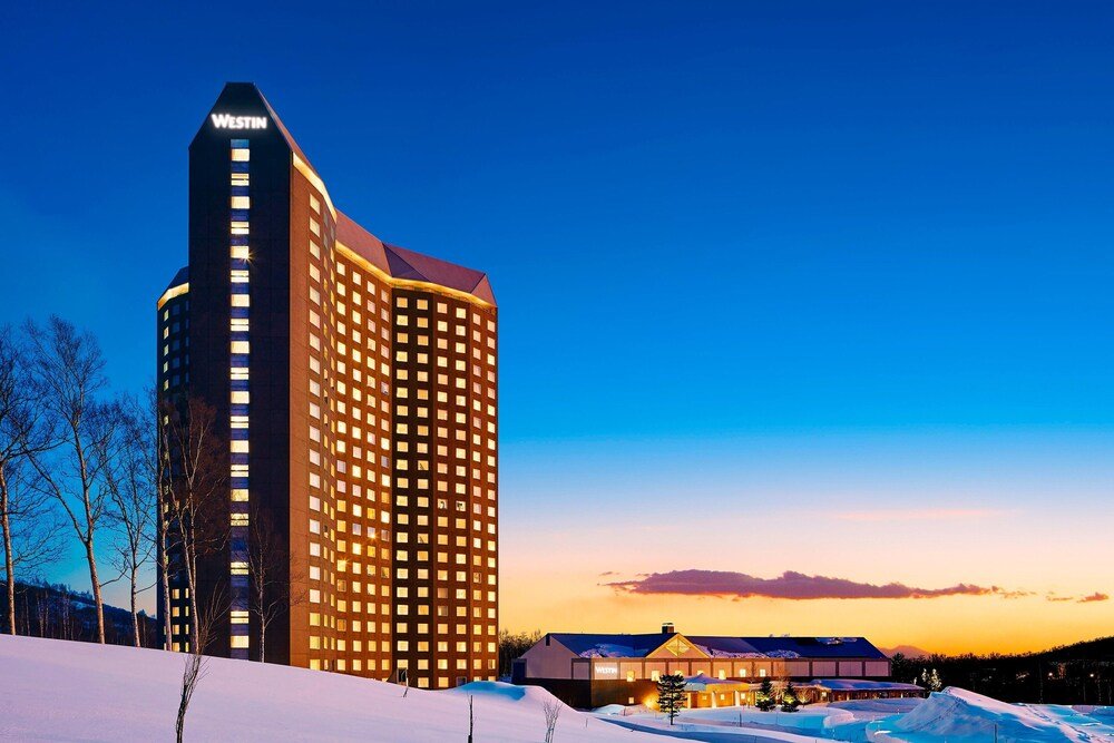 Tall hotel building with a Westin sign