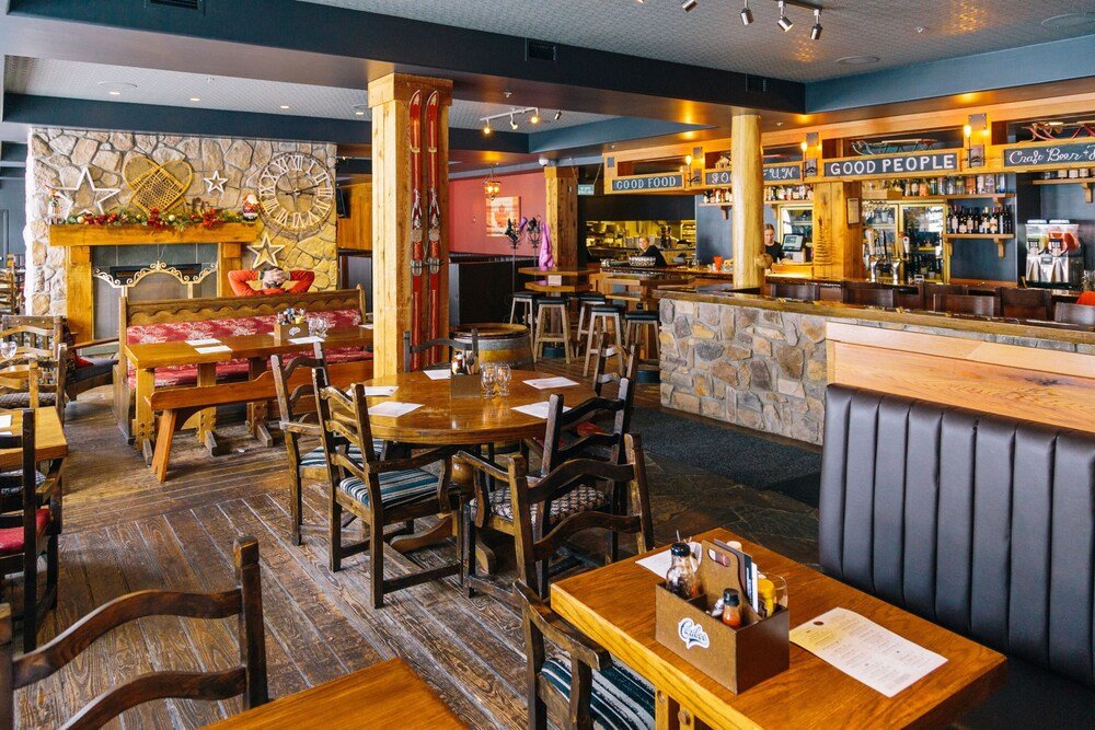 Cozy restaurant dining area at White Crystal Inn in Big White