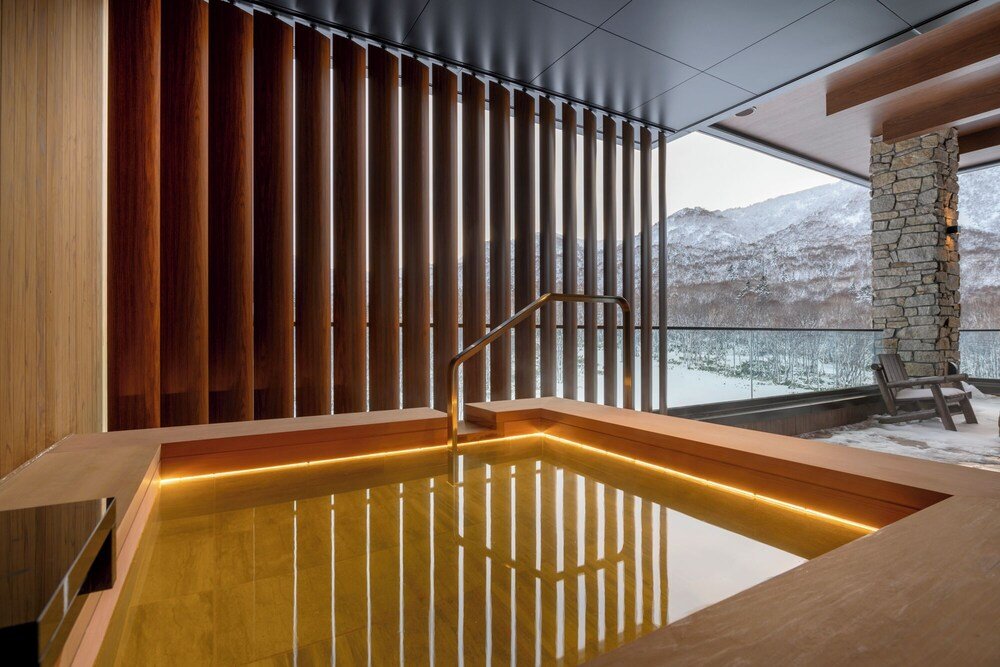 Spa area with a wooden bathtub